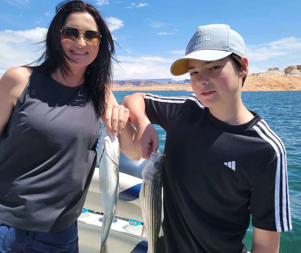 It’s “Fish On” with Ambasador Guides Lake Powell, AZ.  Give us a call for a trip fishing with Capt. Bill serving the area since 1979.